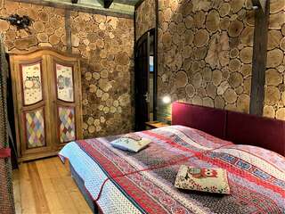 Гостевой дом Альфа Бетта Cемейный номер "Гнездо Совы"-2